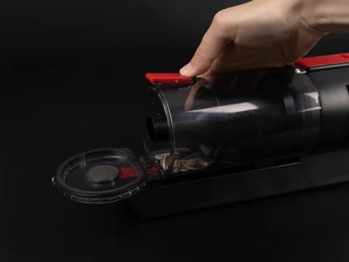 Відкриття контейнера автопилососа VOIN V80 для швидкого очищення від пилу та сміття